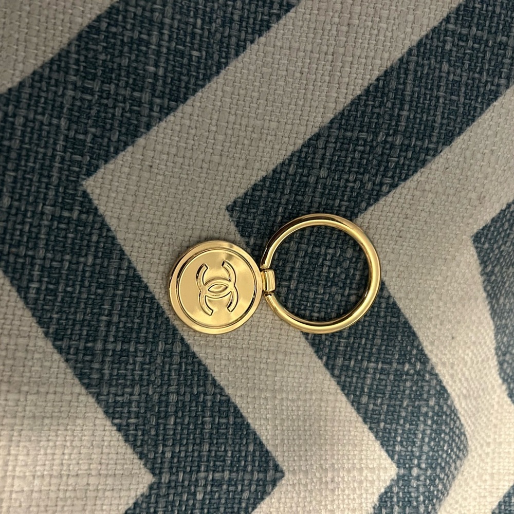 CHANEL Gold Logo phone holder